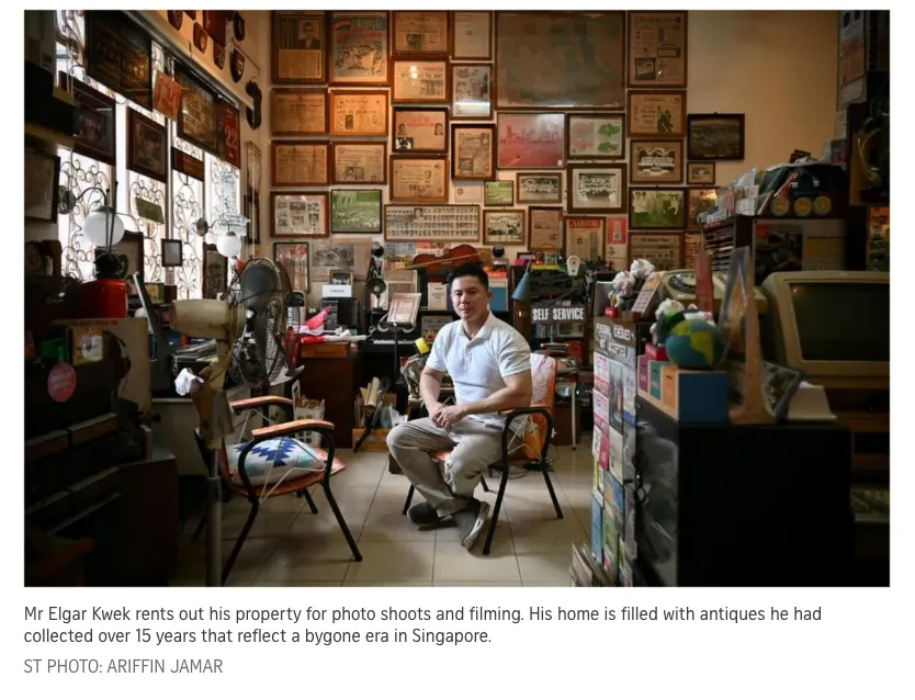 Mr Elgar Kwek seated in his antique-filled Katong home, which he rents out for photo shoots and filming